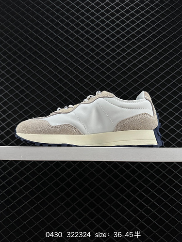 220 New Balance adopts suede and dyed Oxford fabric splicing to form a midsole with high elasticity 